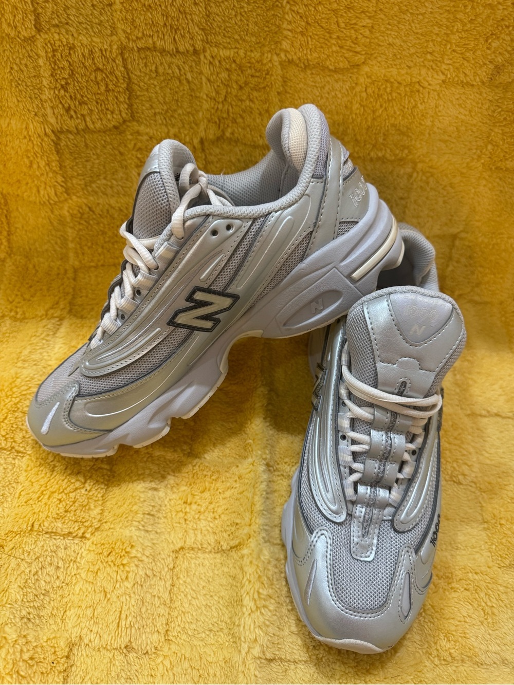 New Balance Silver and Light Gray Runner Sneakers